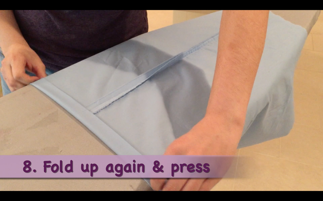 How to Make a Pillowcase Dress: Step 8, fold another 1 inch hem & press. MotherDaughterProjects.com