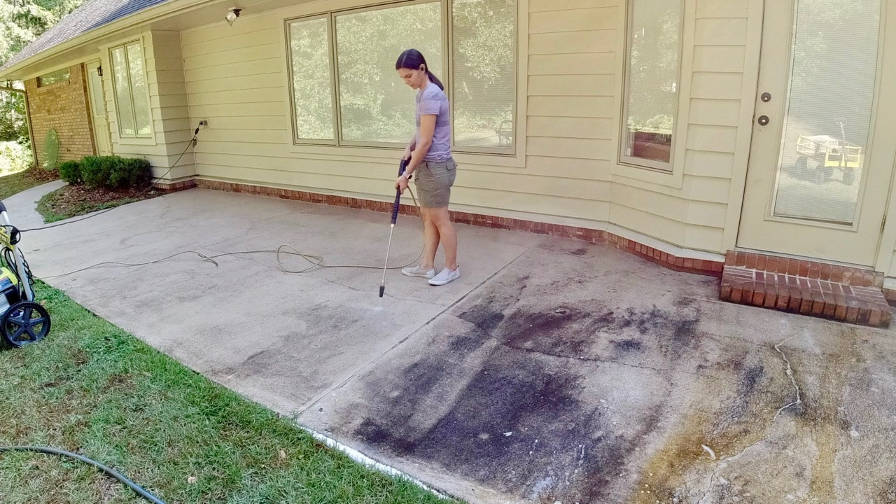 Cleaning with the Ryobi electric pressure washer. 