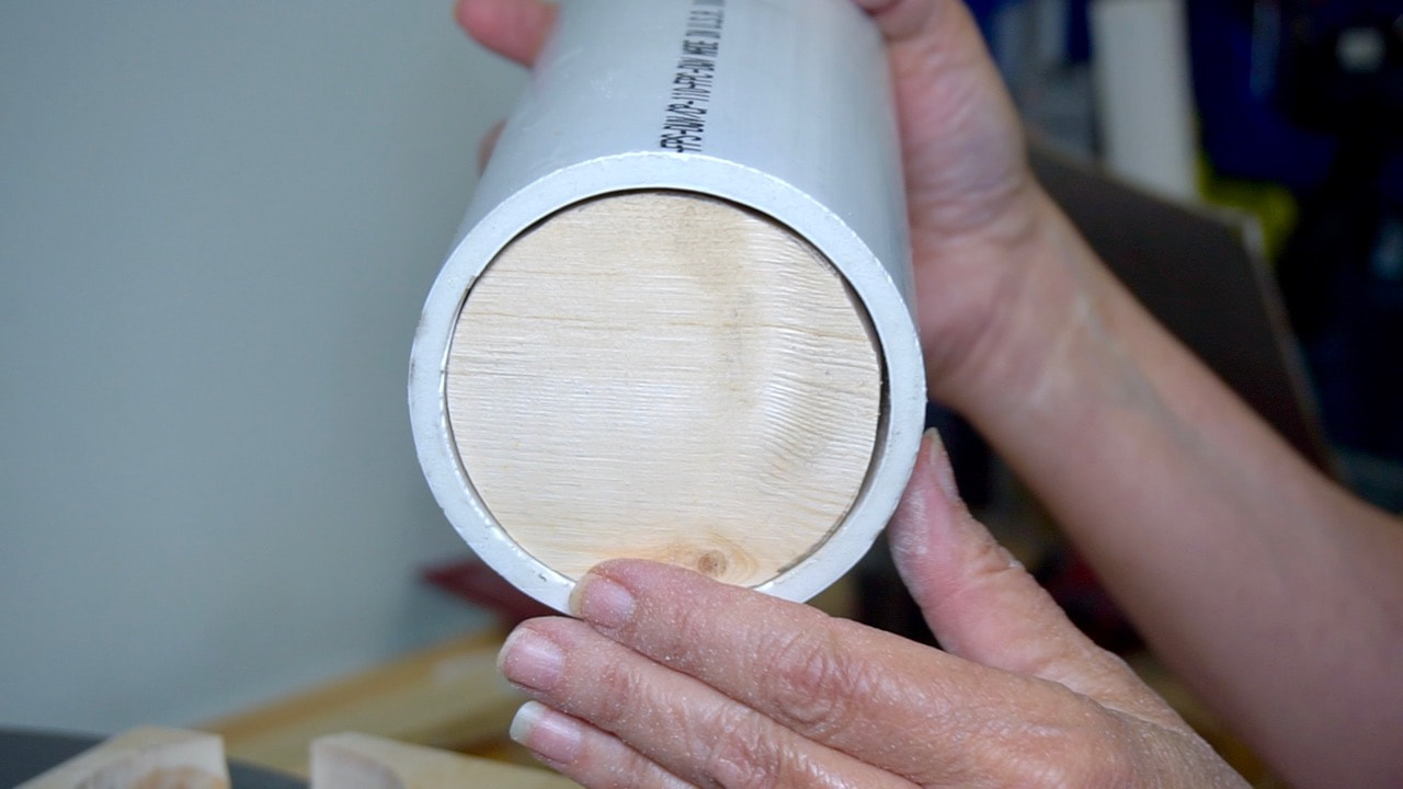 The wood round in place in the PVC.