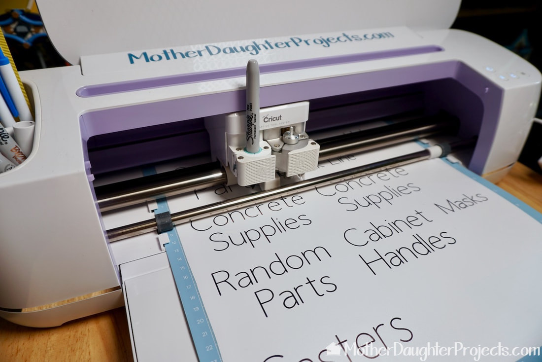 The Cricut will write the labels and cut them at thee same time!