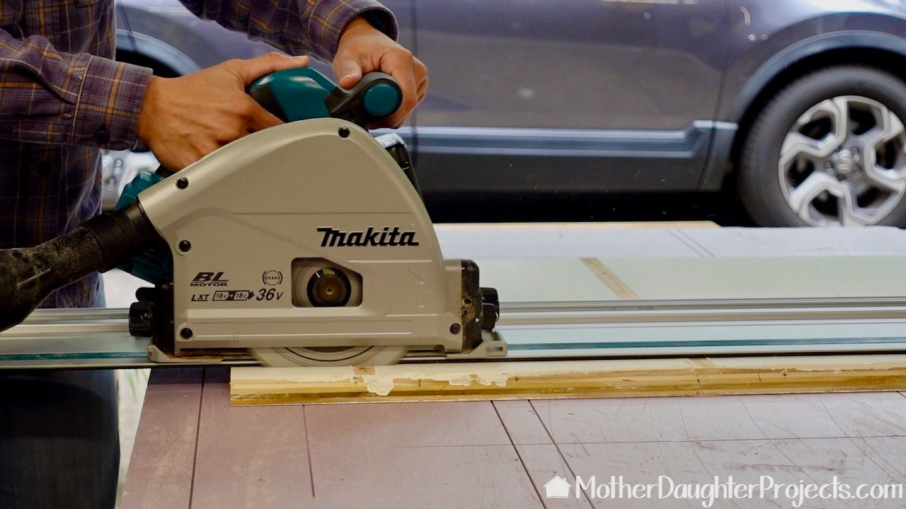 This is a Makita track saw with track we are using to cut down the plywood. 