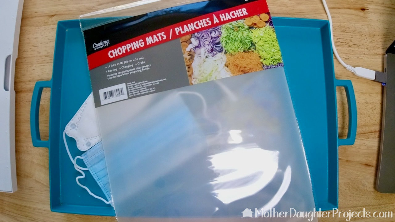 Use Dollar Store Cutting Mats to Make Ear Savers - Mother Daughter