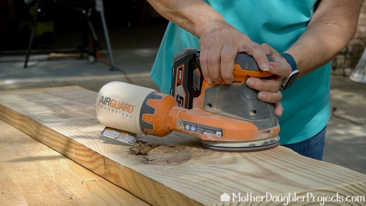 This Ridgid cordless sander is our go-to tool of choice.