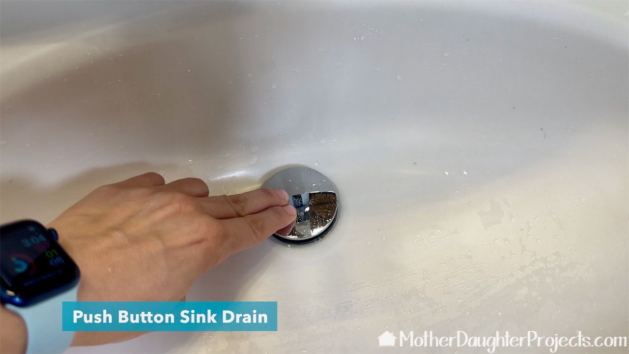 How to install a pop up sink stopper featured on the Kohler tome faucet. 