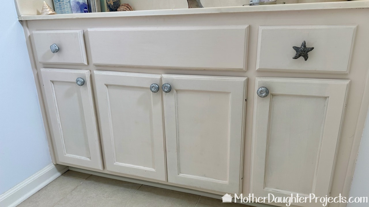 This half bath was in need of a full makeover starting with these cabinets.
