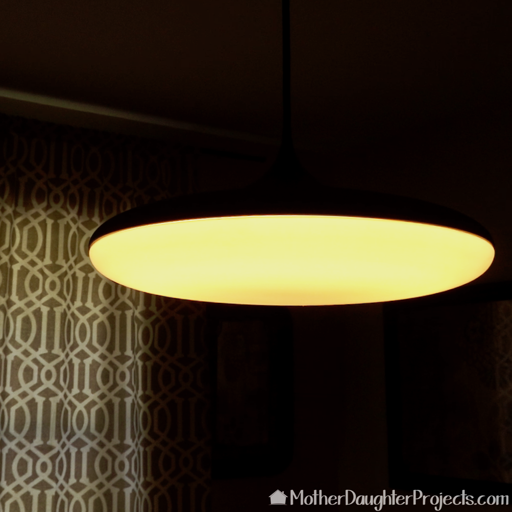 The Philips Hue pendant with warm white light selected. 