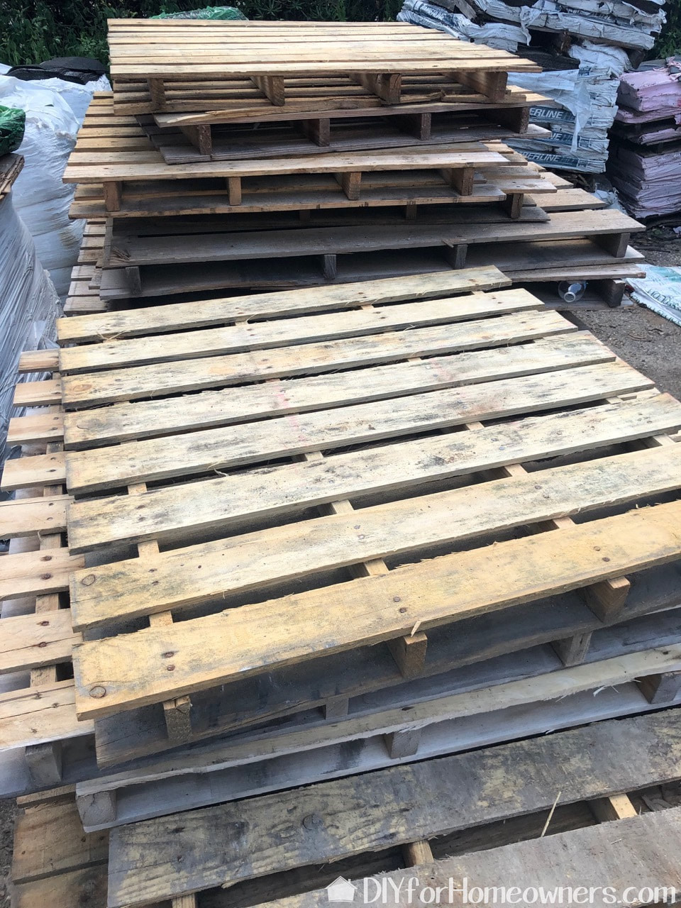 Piles of pallets ready for DIY projects!