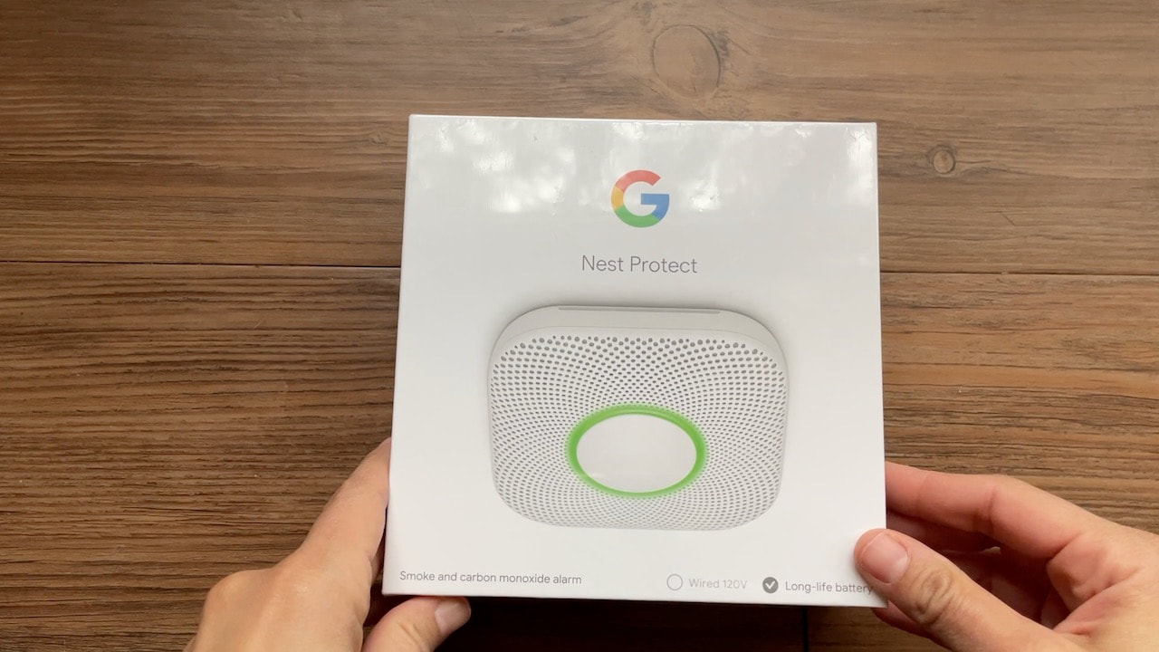 Opening the Google Nest Protect smoke/co detector.