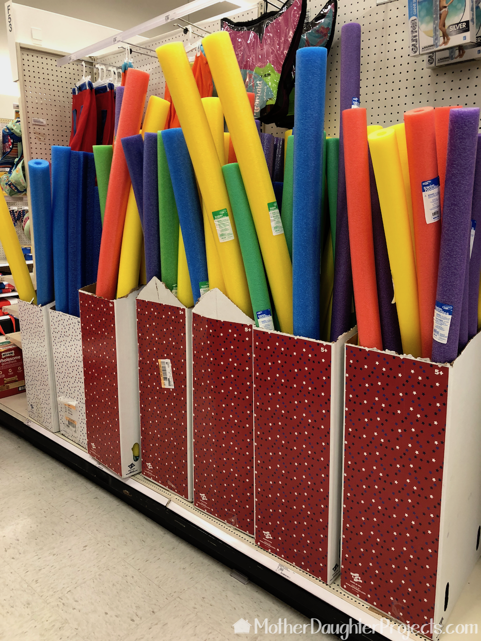 The pool noodles in the Target display.