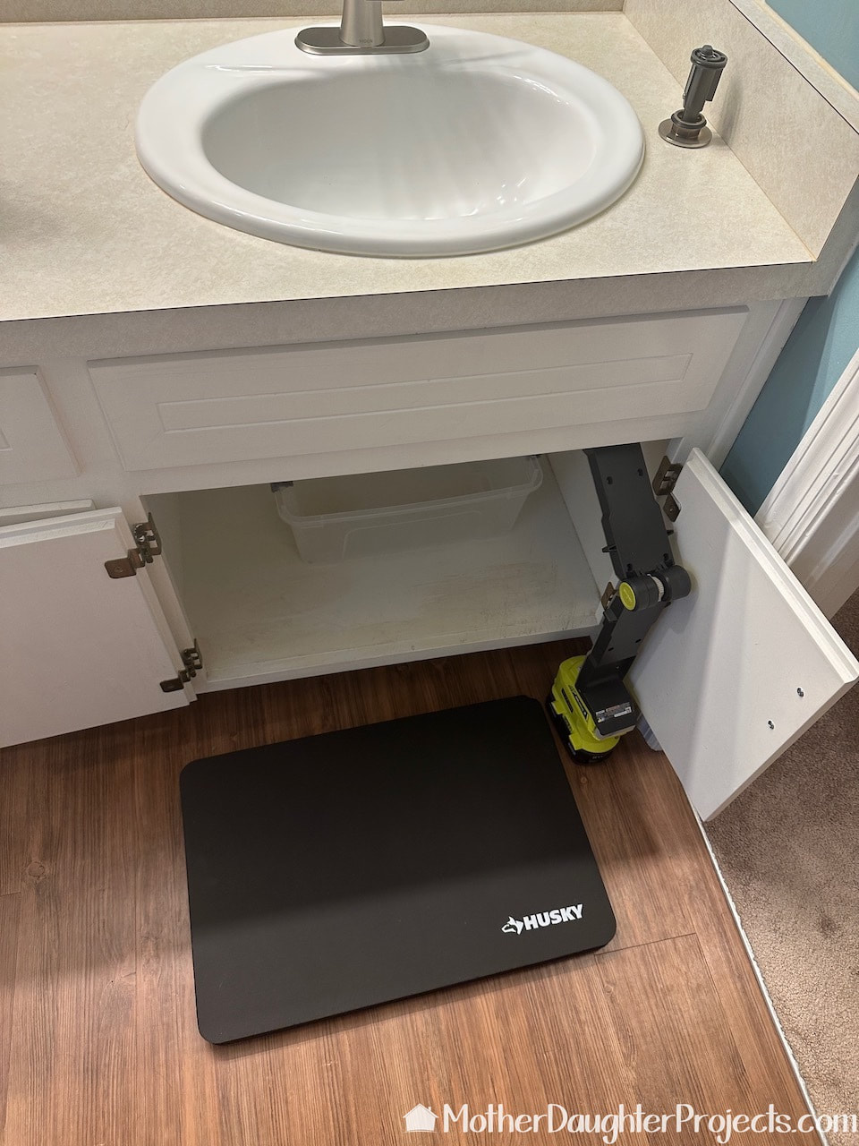 For comfort in installing this Moen Liso sink faucet we are using the Husky 2 soft foam kneeling pad.