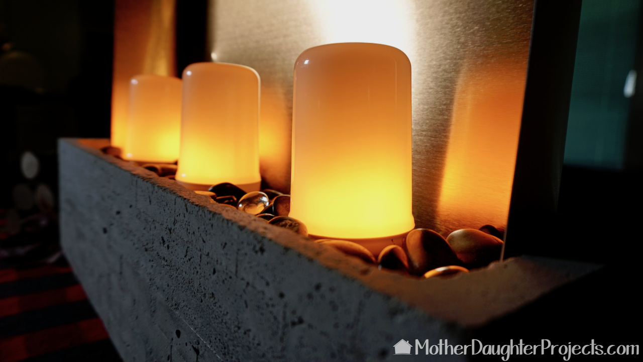 We used MD Building Products copper color aluminum to reflect the light of the bulbs. 