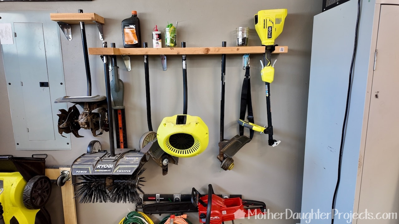 Here are the Ryobi Expand-It tools on the storage shelf. 