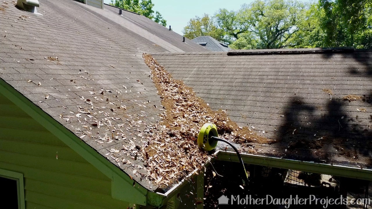 The Ryobi gutter blower attachment did a pretty good job on the gutters, but couldn't budge stuff that sat in the valley.