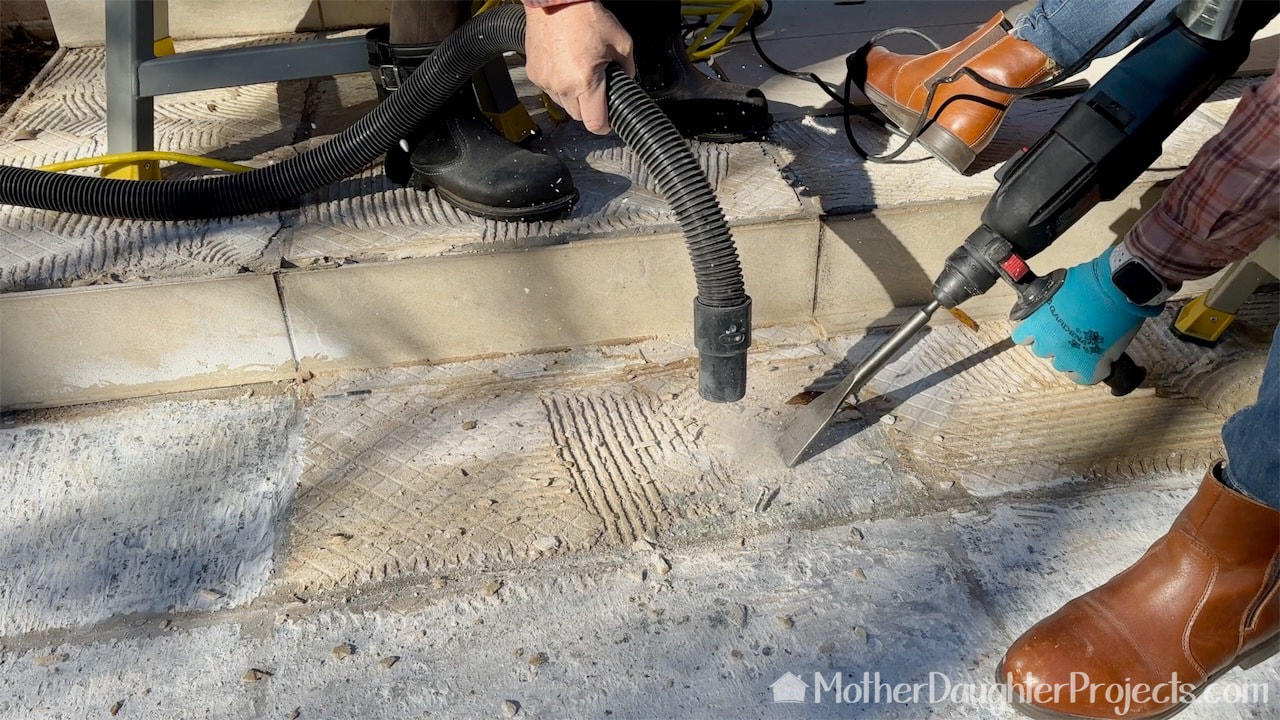 Wear protective gear when breaking up the mortar so you don't create it in.