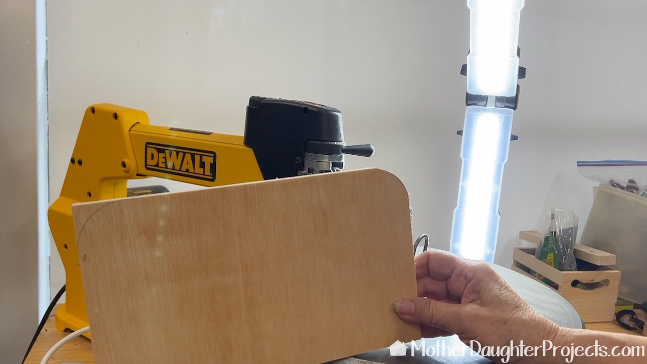 The DeWalt scroll saw was used to cut curves in the back panel piece. That Ryobi lights is helpful to see what you're cutting. 