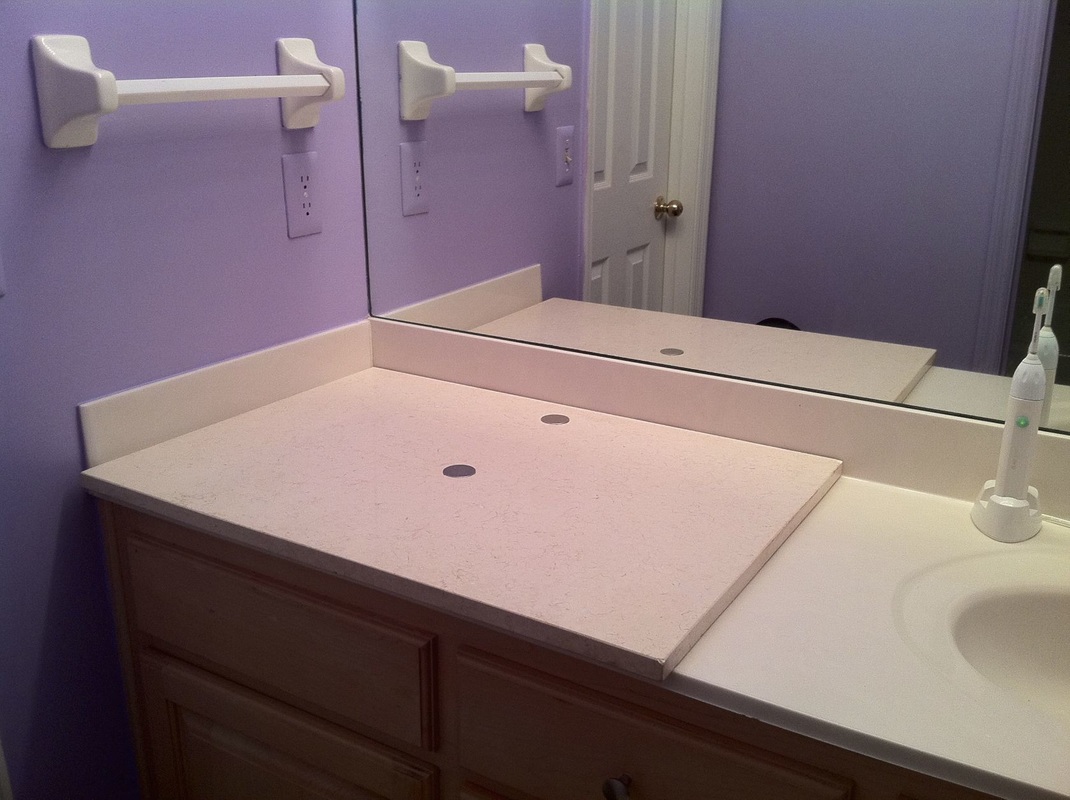 Remove second unused sink, cover with a piece of marble or other material for more counter space. MotherDaughterProjects