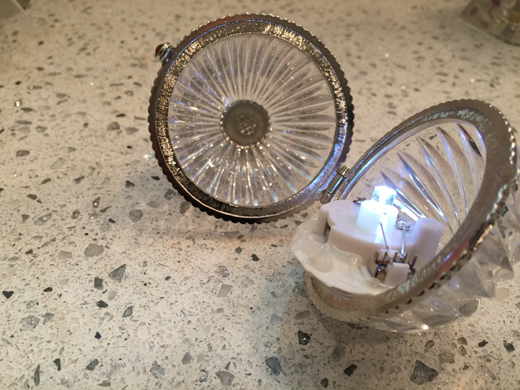 Small LED light placed inside Lenox crystal ornament. MotherDaughterProjects.com