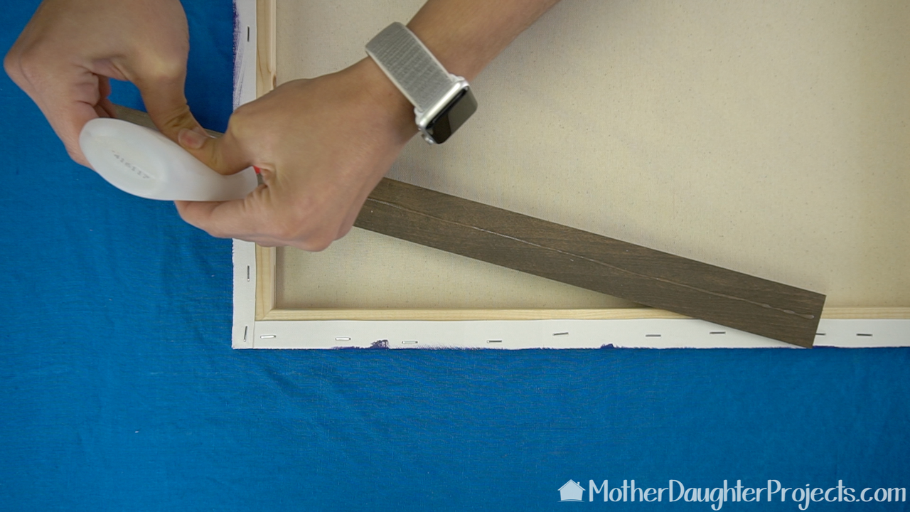 Watch how to make a simple wood frame for your canvas art!