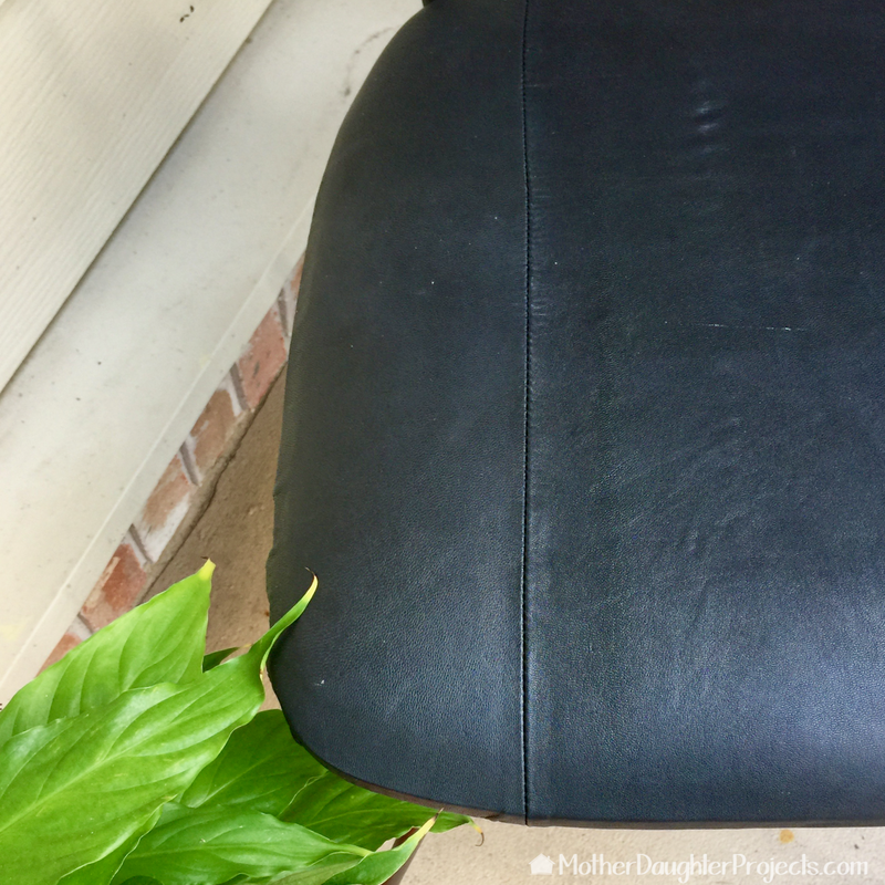 Learn how to upcycle a chair using a thrifted leather skirt!