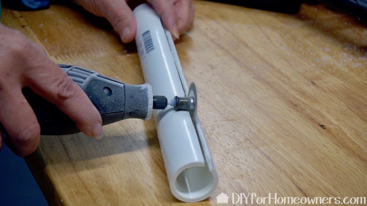 Dremel rotary tool fitted with a sanding disk