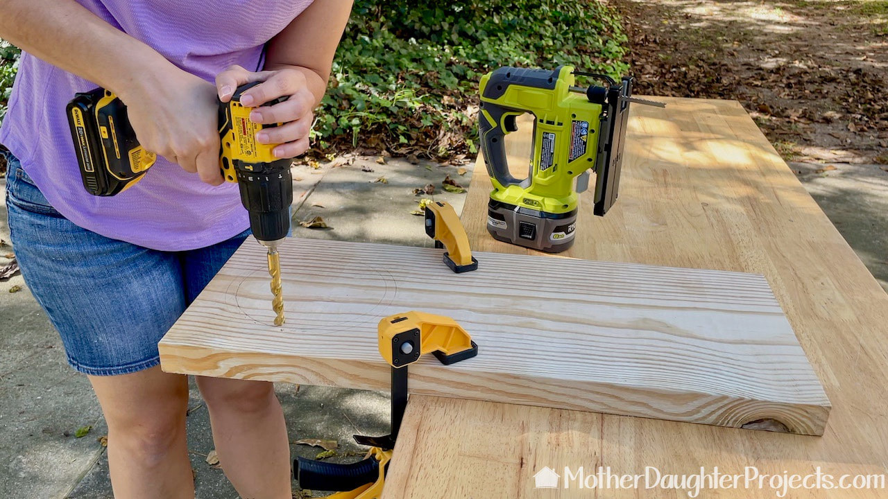 Steph used a battery powered DeWalt drill to make a starting hole for the jig saw. 