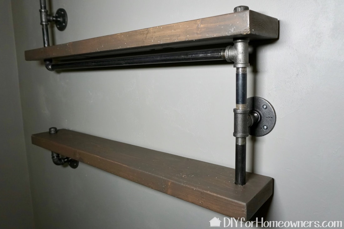 The four metal flanges hold the bookshelf in place. 