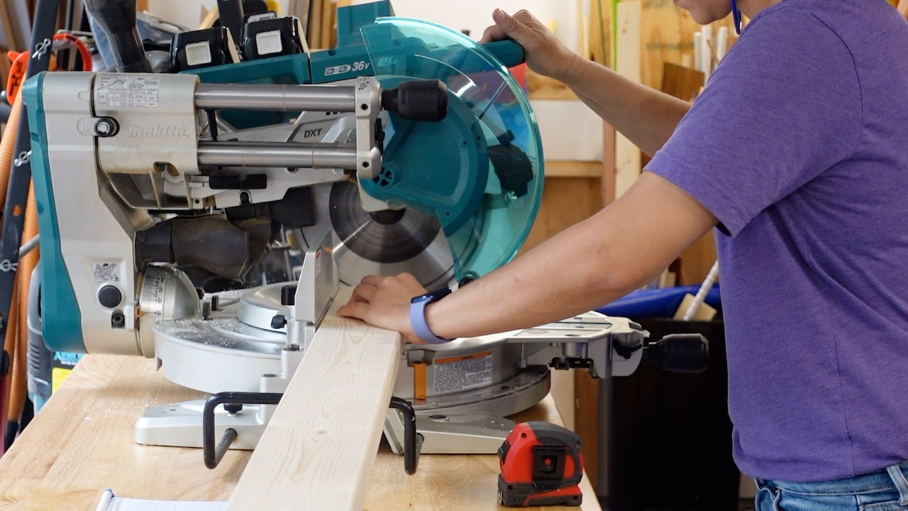 Cutting the 2x4s with the Makita miter saw.