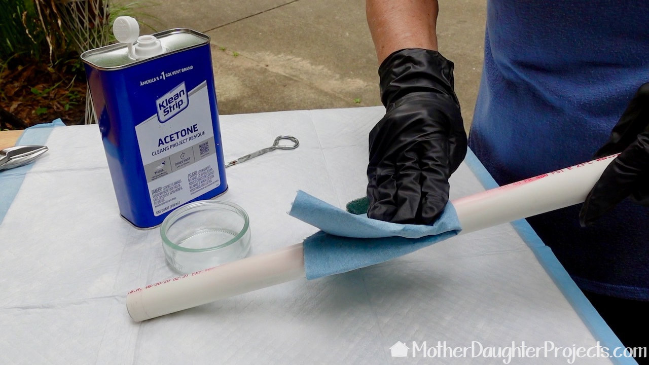 Use acetone to remove the red printing on the PVC pipe.