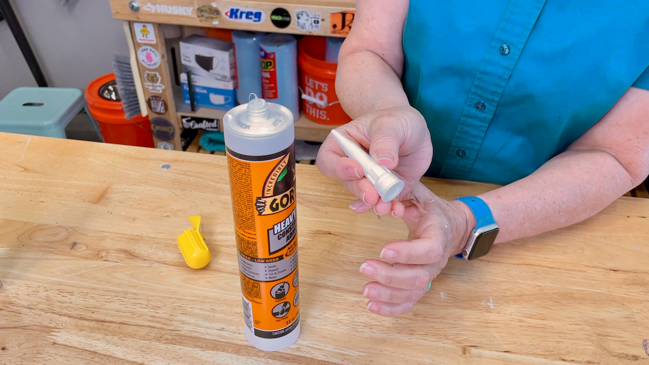 Showing a replaceable tube tip on a tube of Gorilla construction adhesive. 