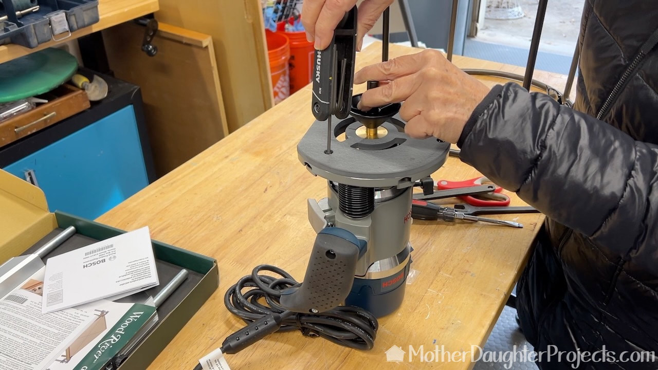 Using a Bosch centering cone to line up the bushing with the collet. 