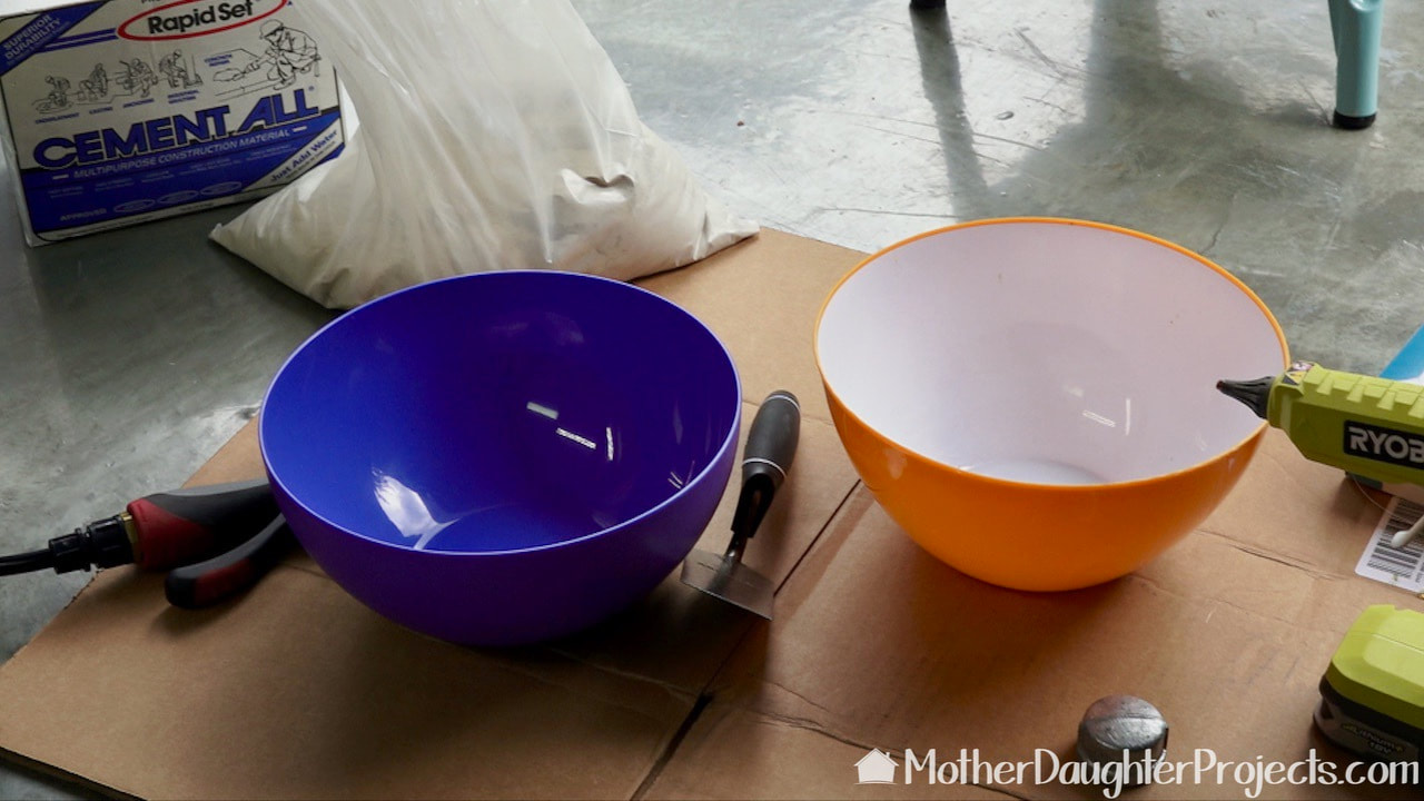 Selecting a plastic bowl to use for the Rapid-set Cement All concrete base. 