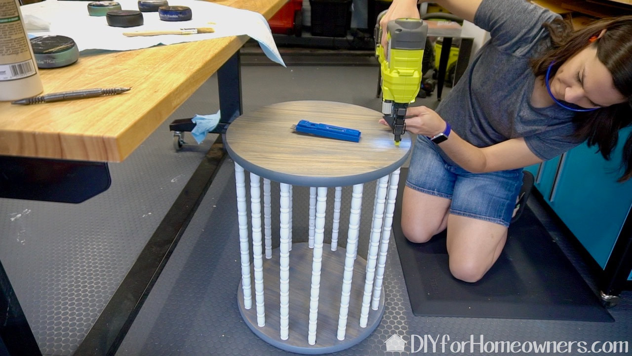 Using the Ryobi airstrike brad nailer to finish the top side of the upcycle crib storage end table.