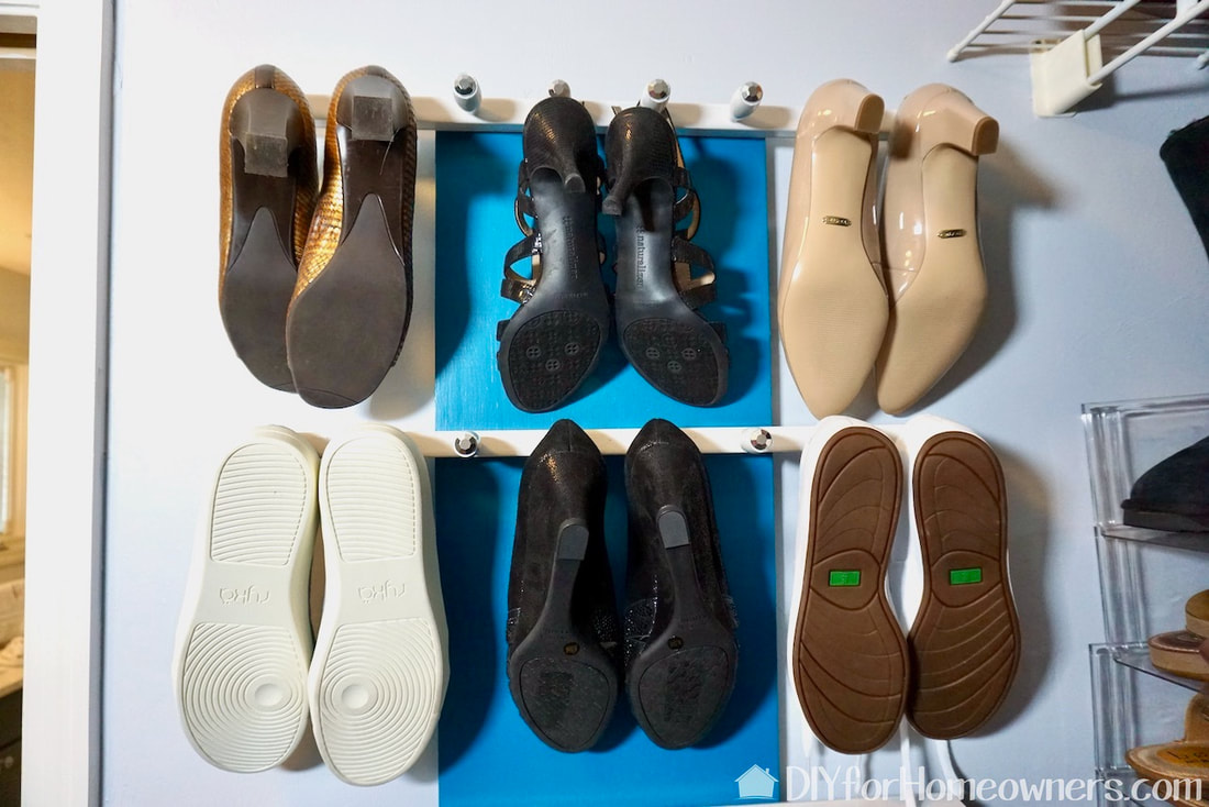 The wall hung shoe storage unit can hold up to 12 pairs of shoes.