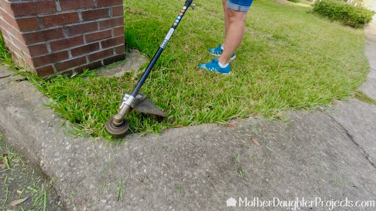 Using the Ryobi Expand-It string trimmer.