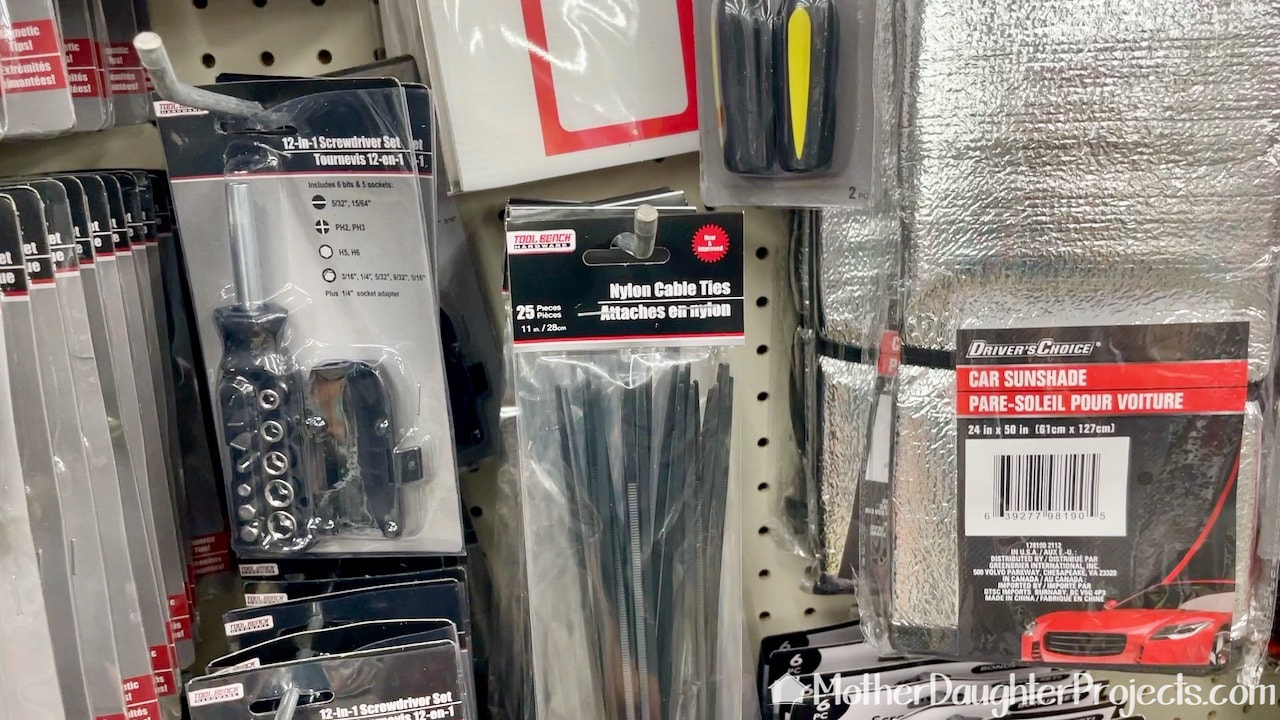 Zip ties or nylon cable ties can be found in the tool/automotive section of the Dollar Tree.
