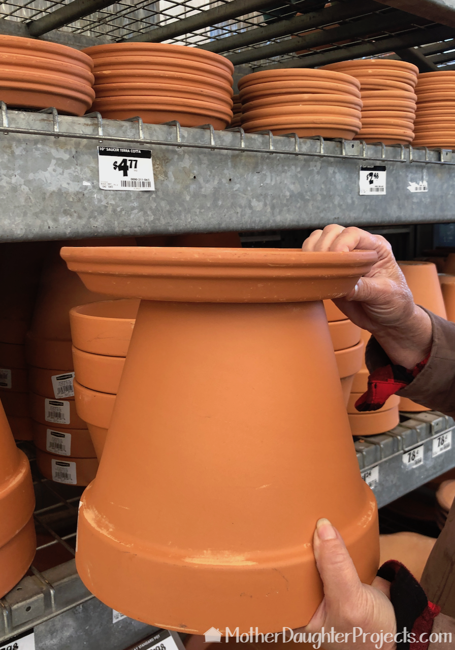 Another great option would be to glue a terra cotta saucer to the underside of a pot.
