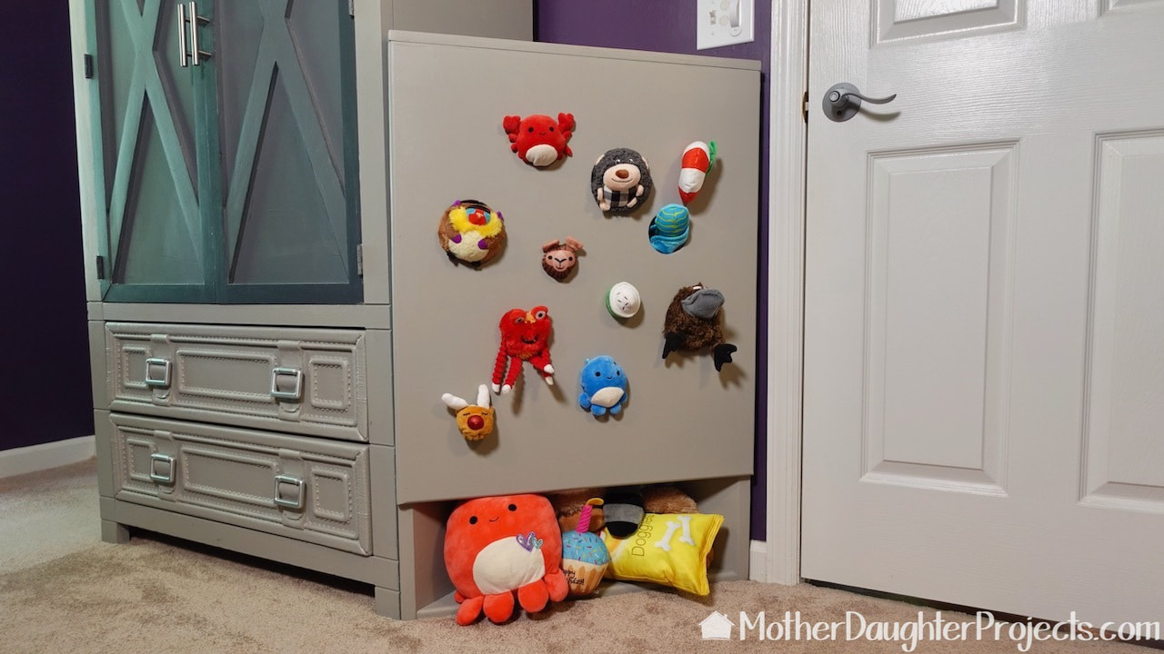 The holes in thee storage unit make a great place to put a few toys for more fun for your dog.