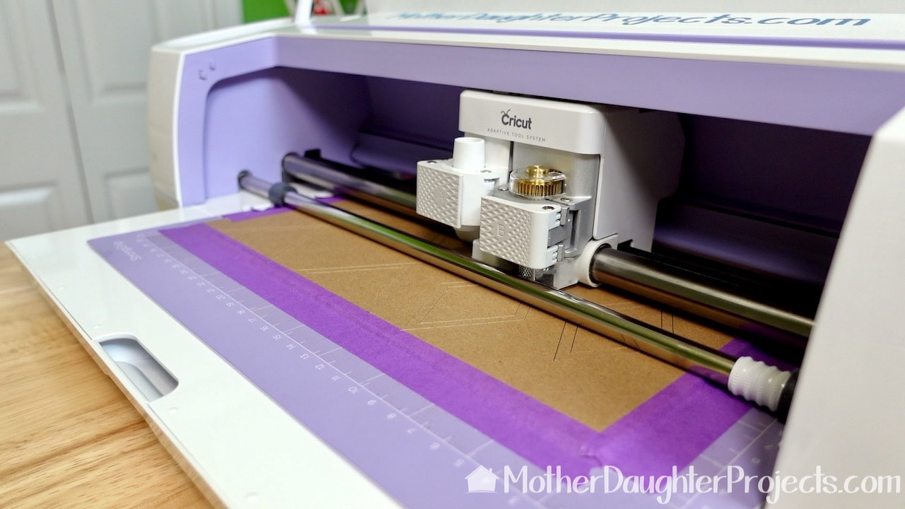Cutting the chipboard on the Cricut Maker.