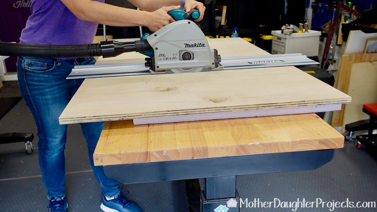 We used our Makita track saw to cut down the plywood.