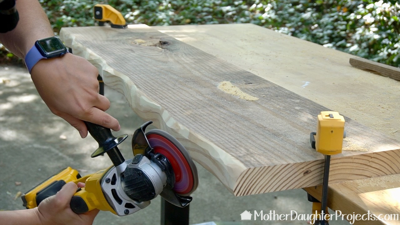 Using the DeWalt angle grinder to fake the live edge.