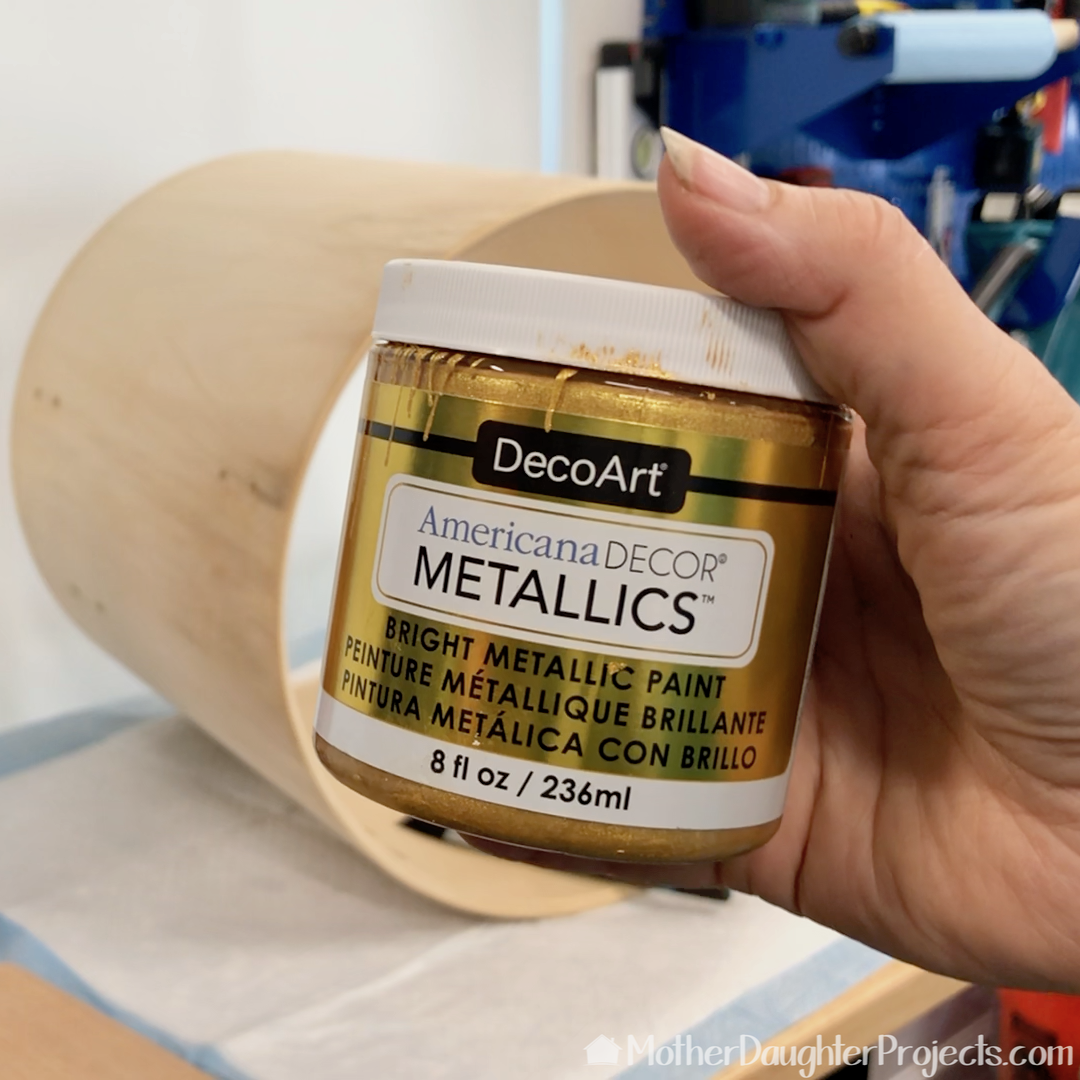 To make the interior glow, we painted it with this DecoArt metallic gold paint. 