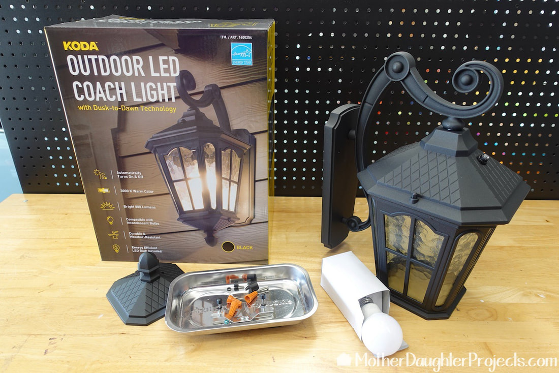 Koda Outdoor LED Coach Light packaging.