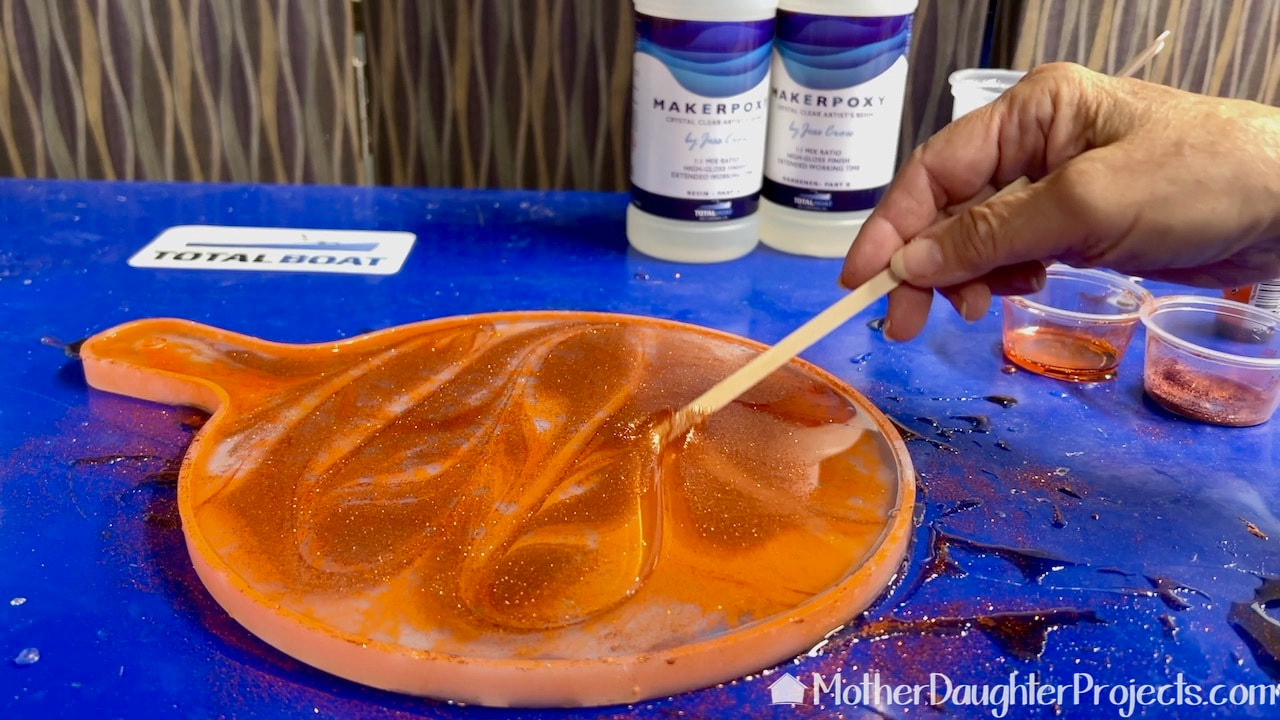 Making a fall glittery orange charcuterie board from the Total boat round silicone mold.