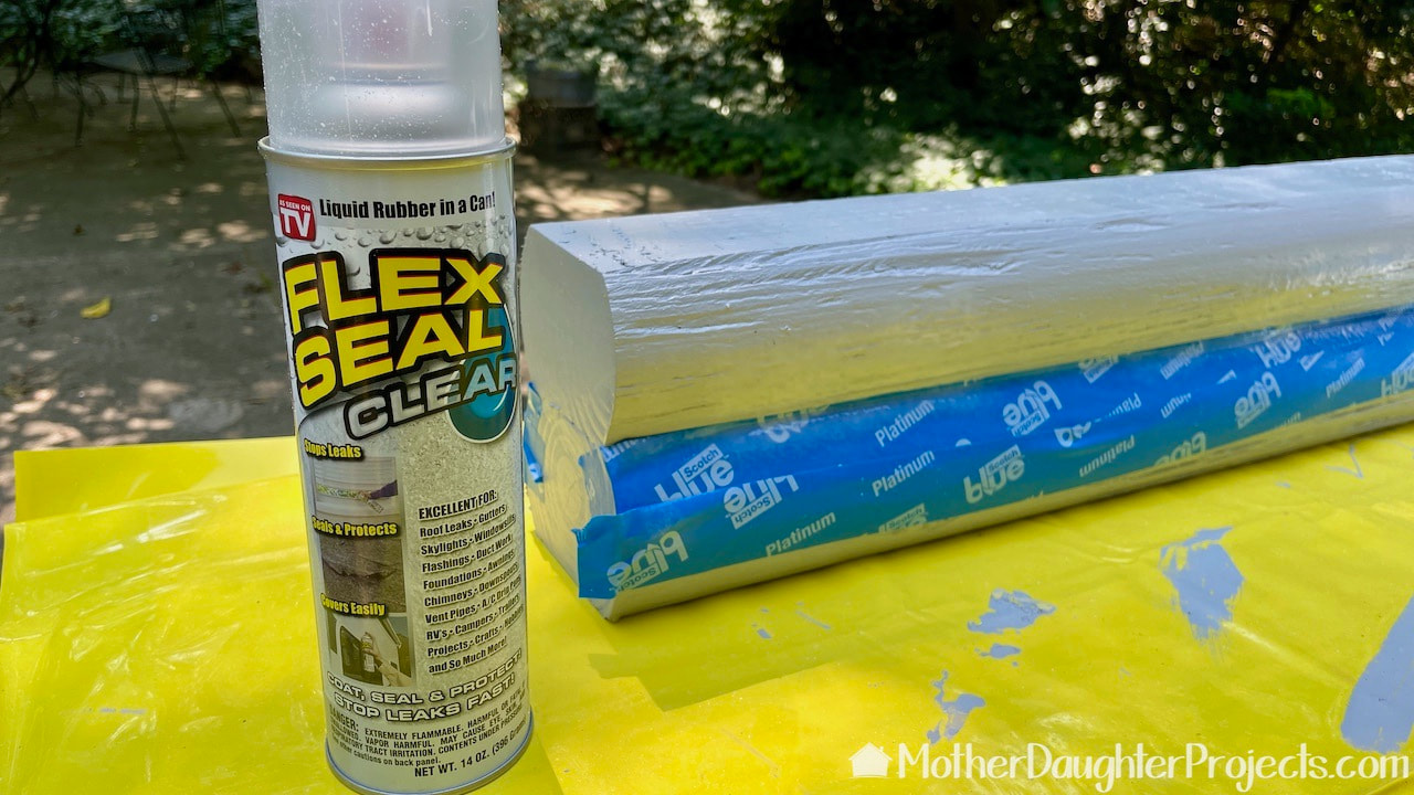Adding Flexseal liquid rubber in a can to the top of the kayak stand.