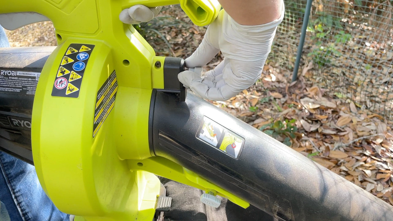 Sometimes you'll need to clear the Ryobi mulcher blades if a stick gets stuck.