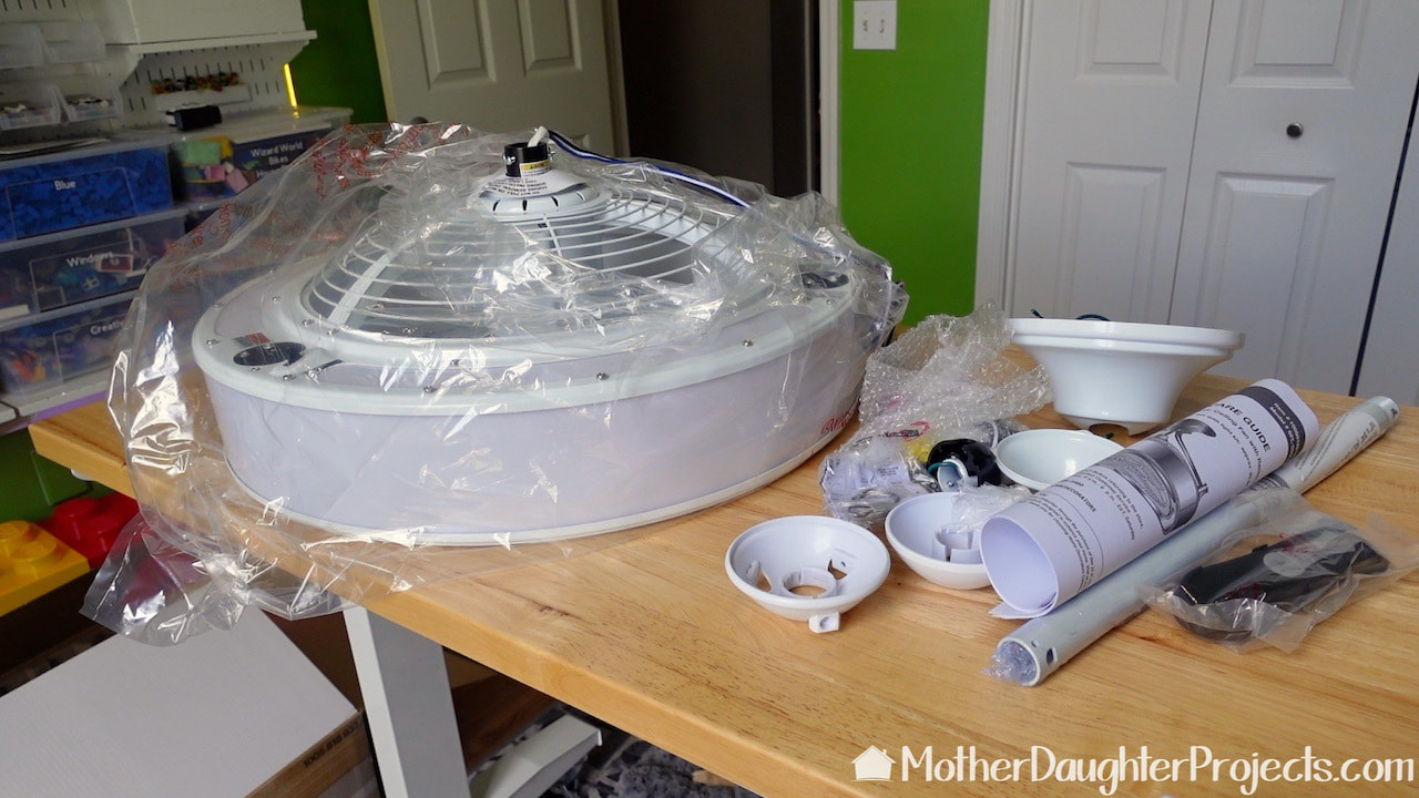 Unboxing the Home Depot's Home Decorators enclosed ceiling fan.