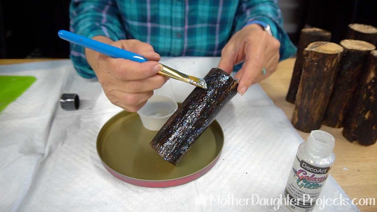 The wood logs were give a bit of shimmer with this DecoArt Galaxy Glitter paint. 