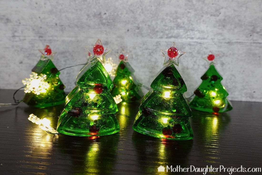 Cute picture of the lighted epoxy mini christmas trees that also can be used as ornaments. 