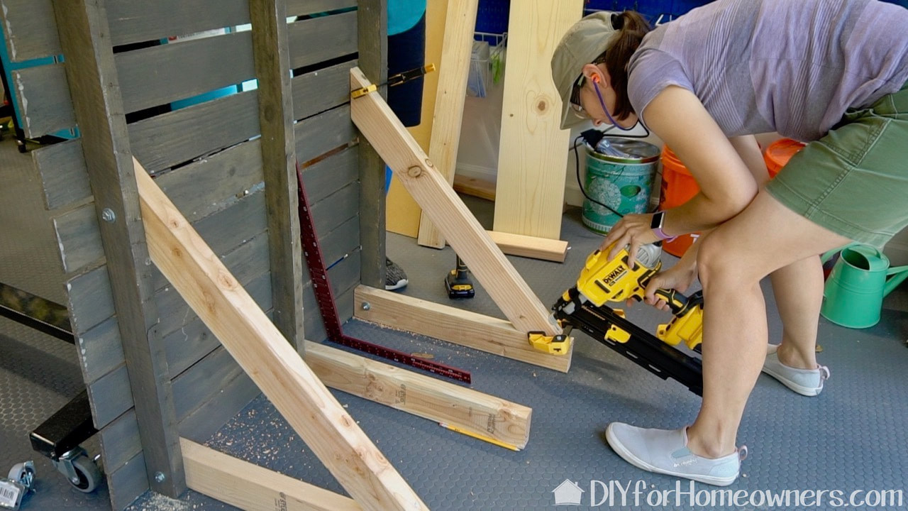 Steph is finishing up the back support with a DeWalt brad nailer. 