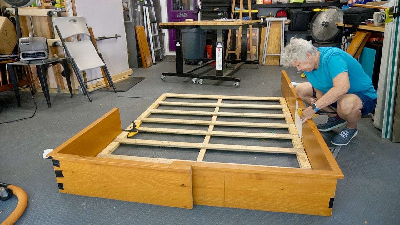 Dry fitting the sides of the bed frame to determine what needed to be cut.